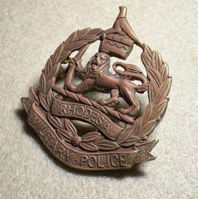 Rhodesian Corps of Military Police 1970-1980 - Cap Badge, Brass with Bird - Variation 1