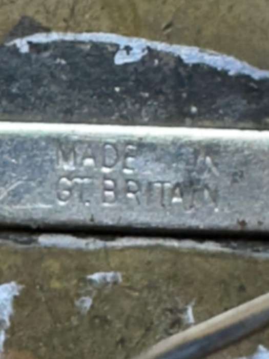 Rhodesian INTAF - BRASS ENAMEL KRAALHEAD VARIANT - MADE GREAT BRITAIN STAMP