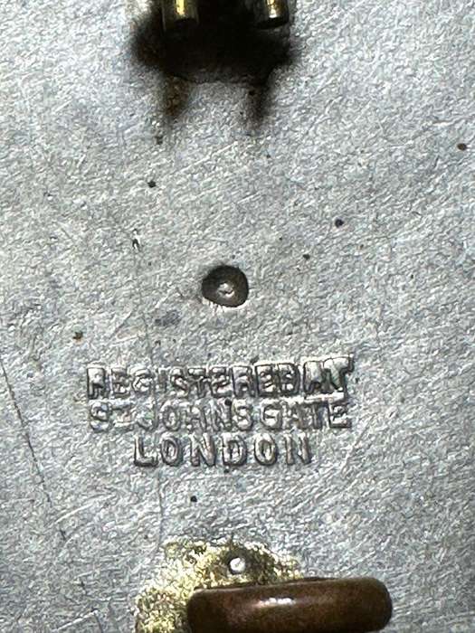 Rhodesian ST JOHNS - BERET BADGE METAL, Registered at St Johns Gate, London
