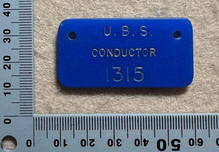 Rhodesian TRANSPORT - UBS CONDUCTOR BADGE PLASTIC - NO 1315