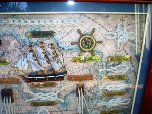 Beautiful framed knots of the sea, old ship and other ship items framed behind glass