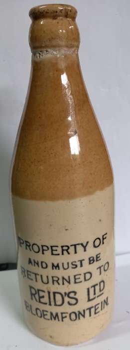 Antique Reid`s Ltd Bloemfontein Ceramic cork stopper bottle-good condition