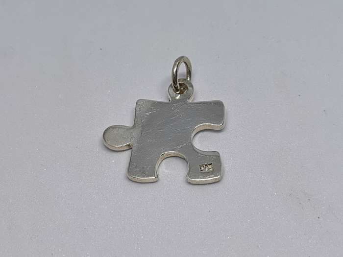 Silver Puzzle Piece Pendant