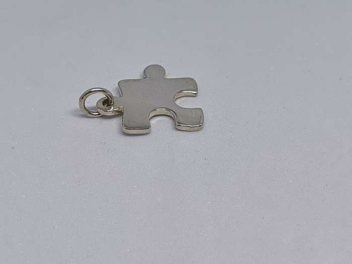 Silver Puzzle Piece Pendant