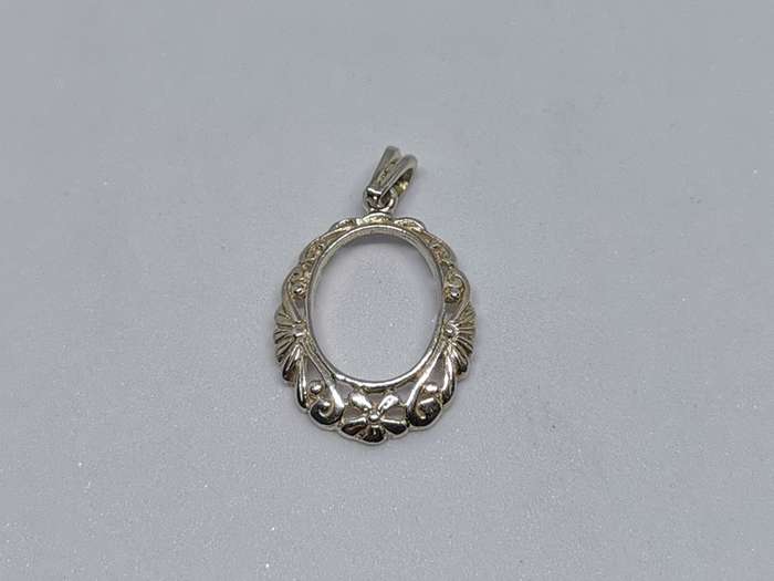 Detailed Silver Pendant