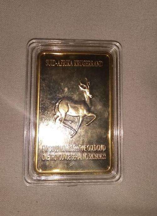 2 x spirngbok bullion gold bars, 1 x mayan gold round coin/bar