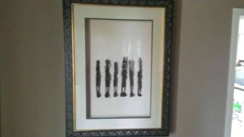 Professionally framed hand carved African staTue art .
