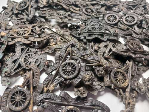 50 x  WW2 Natal Field Artillery cap badges ( PLEASE NOTE ALL LUGS AND PINS ARE DAMAGED )      Lot B