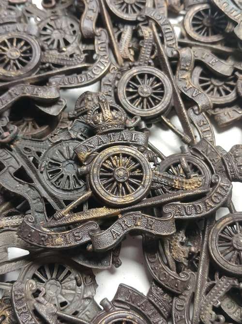50 x  WW2 Natal Field Artillery cap badges ( PLEASE NOTE ALL LUGS AND PINS ARE DAMAGED )      Lot B