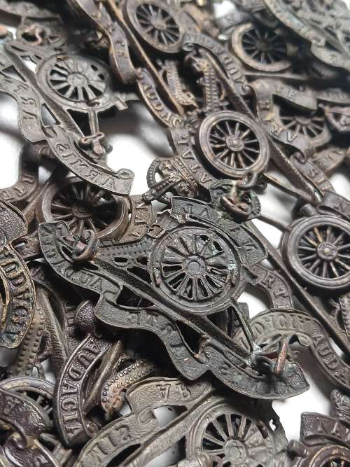 50 x  WW2 Natal Field Artillery cap badges ( PLEASE NOTE ALL LUGS AND PINS ARE DAMAGED )      Lot B