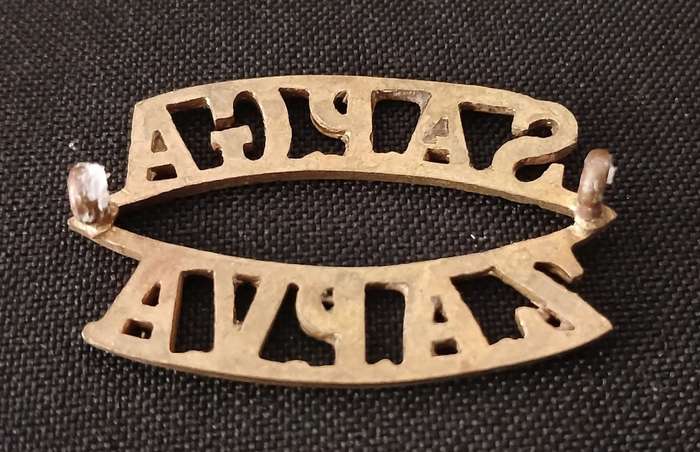 S.A.P.G.A. SOUTH AFRICAN ( 2 TYPE ) PERMANENT GARRISON ARTILLERY SHOULDER TITLE          C23