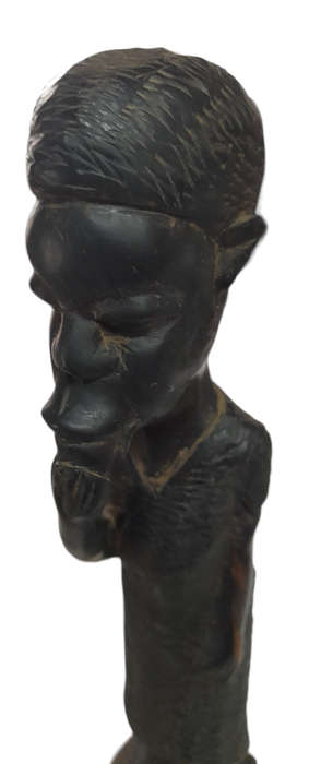 Vintage Handcrafted Man Putting Something In His Mouth