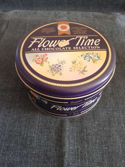 Vintage round biscuit storage tin