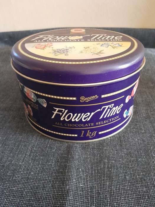 Vintage round biscuit storage tin