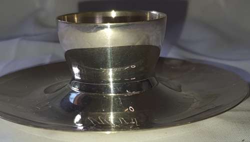 A SILVER PLATED VINTAGE CANDLE HOLDER SOLD AS IS