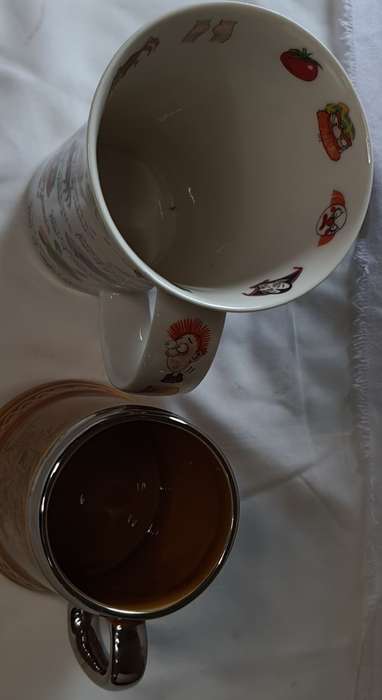 TWO COLLECTORS CERAMIC BEER MUGS SOLD AS IS