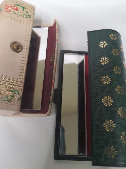 A COLLECTION OF WOMANS LIPS STICK POUCHES AND A SILVER PLATED JEWELRY BOX SOLD AS IS