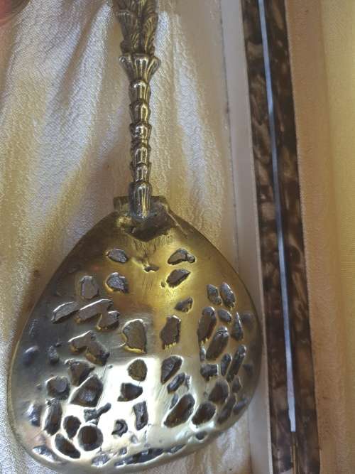 AN ANTIQUE ORNATE SALAD SERVING SET LADEL AND FORK
