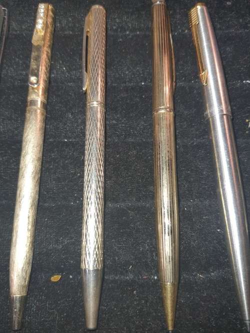 A COLLECTION OF GOLD PLATED PENS AND PENCILS FOR THE COLLECTORS SOLD AS IS