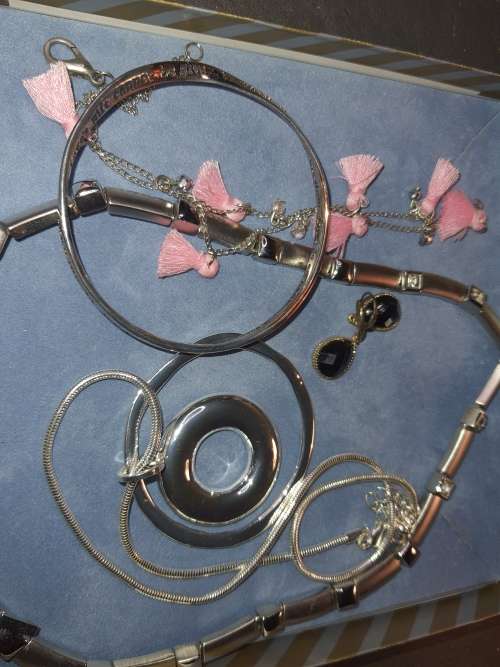TWO SETS OF COSTUME SILVER PLATED NECKACE SETS SOLD AS IS
