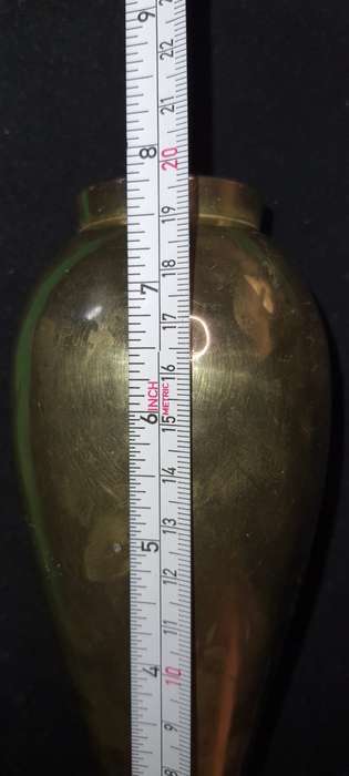 A VINTAGE BRASS VASE SOLD AS IS