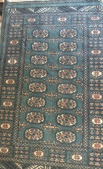 A beautiful hand made Persian carpet with the certificate on it sold as is