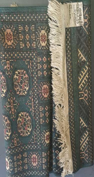 A beautiful hand made Persian carpet with the certificate on it sold as is