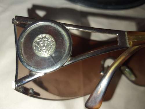 A RARE VINTAGE WOMANS BVLGARI SUNGLASSES SOLD AS IS