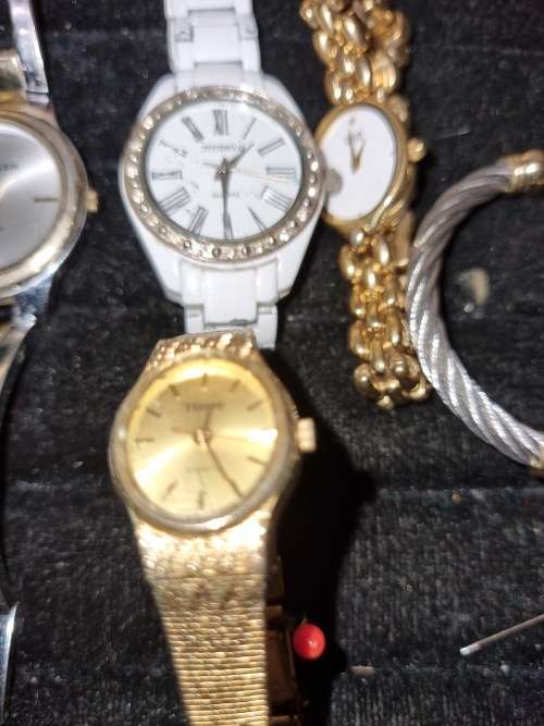 A COLLECTION OF WOMANS WATCHES SOLD AS IS NOT TESTED