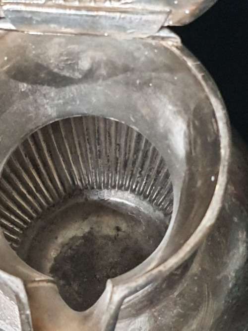 AN ANTIQUE SILVER-PLATED TEA JUG IN GOOD CONDITION ORIGINAL SOLD AS IS