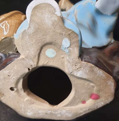 A HAKATA FIGURINE SOLD AS IS
