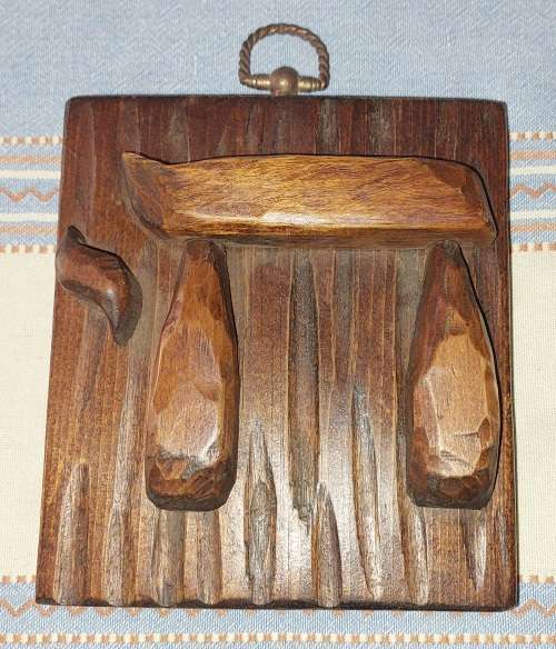 A HAND MADE WOODEN JUDAICA SOLD AS IS