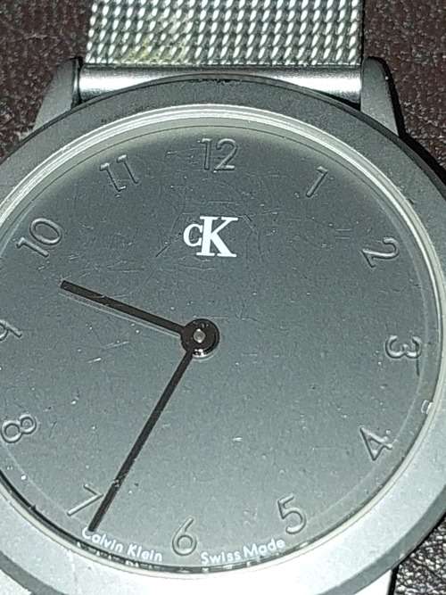 TWO CK SILVER PLATED WRIST WATCHES SOLD AS IS NOT TESTED