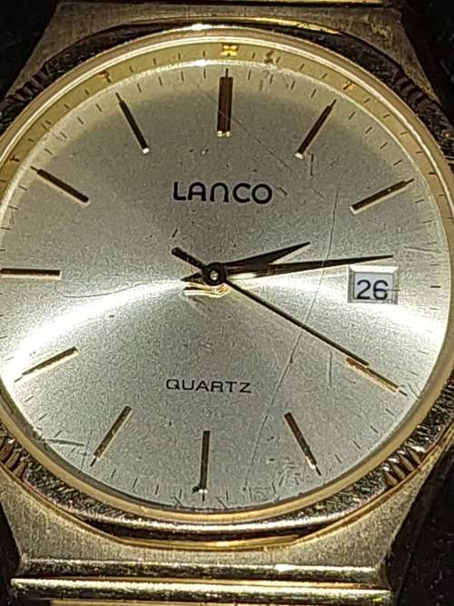 A BEAUTIFUL GOLD PLATED LANCO AND A DIGITI TIME WATCHES SOLD AS IS NOT TESTED