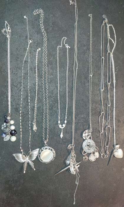 A VINTAGE COLLECTION COSTUME NECKLACES SOLD AS IS