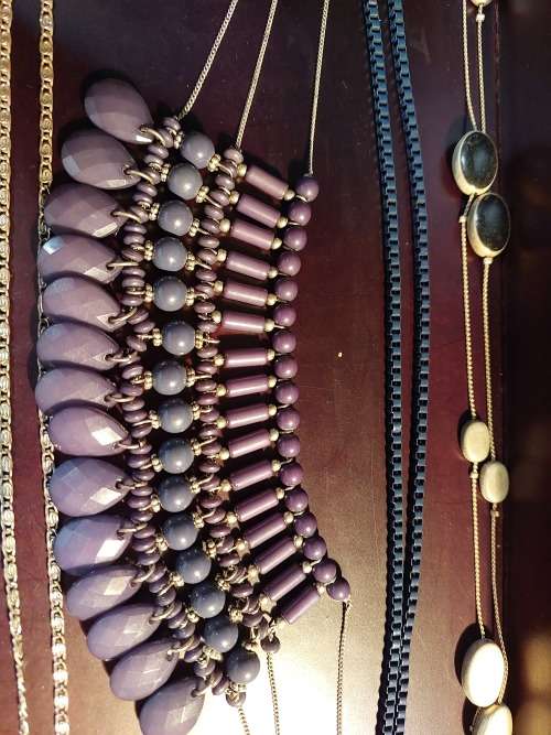 A DESIGNER COLLECTION COSTUME NECKLACES SOLD AS IS