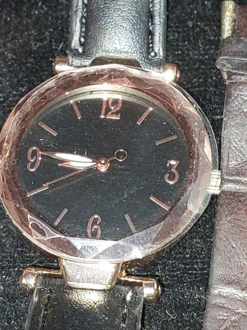 A COLLECTION OF DESIGNER DRESS WATCHES SOLD AS IS NOT TESTED
