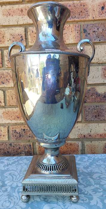 A VINTAGE SILVERPLATED 50-CENTIMETER HIGH ROMAN-STYLE VASE