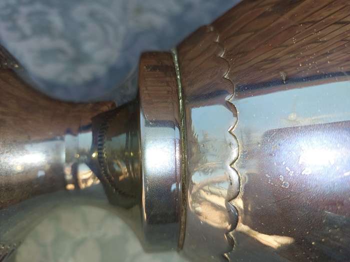 A VINTAGE SILVERPLATED 50-CENTIMETER HIGH ROMAN-STYLE VASE