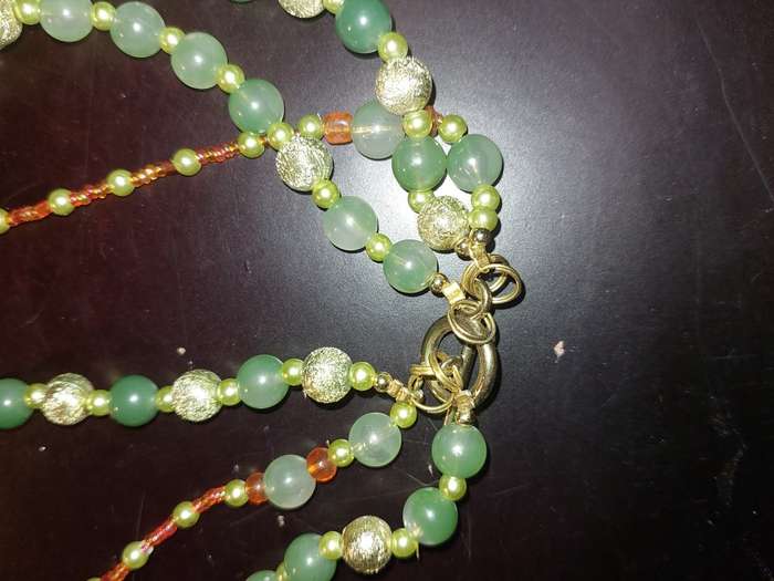 A COLLECTION OF COSTUME NECKLACES SOLD AS IS
