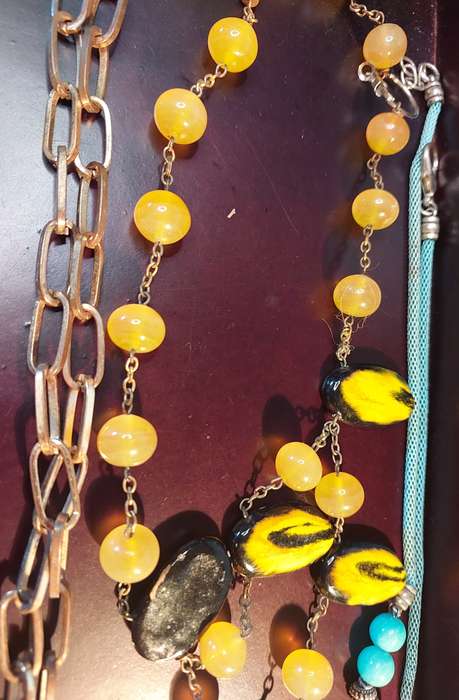 A VINTAGE COLLECTION OF COSTUME NECKLACES SOLD AS IS