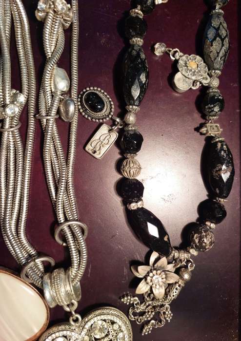A VINTAGE COLLECTION OF COSTUME NECKLACES SOLD AS IS