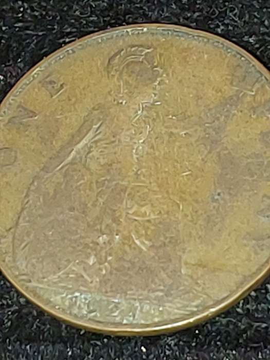 AN ANTIQUE COIN COLLECTION OF 9 ONE PENNY COINS UK