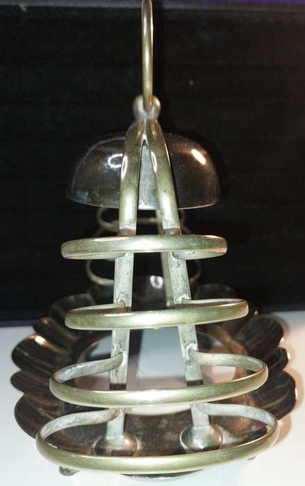 A VINTAGE BREAKFAST TOAST  SERVING STAND SILVER PLATED  SOLD AS IS