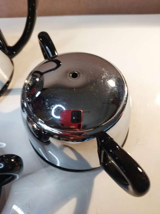 A VINTAGE BLACK PORCELAIN CERAMIC WITH STAINLESS STEEL COVERS TEA POT SET