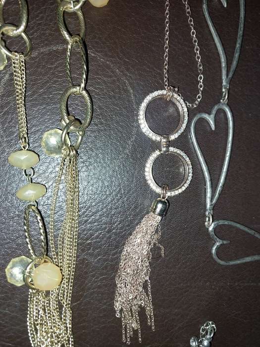 A  VINTAGE COLLECTION OF GOLD PLATED AND SILVER PLATED NECKLACES