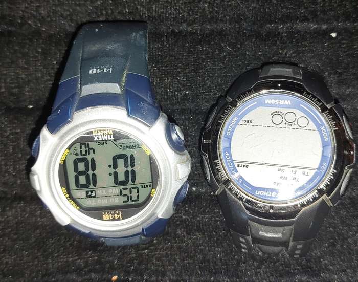 TWO SPORTS WATCHES ONE IS WORKING AND BOTH NEED NEW BANDS