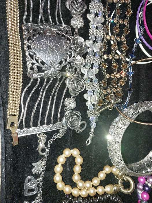 A BULK VINTAGE COLLECTION OF BRACELETS AND BANGLES SOLD AS IS