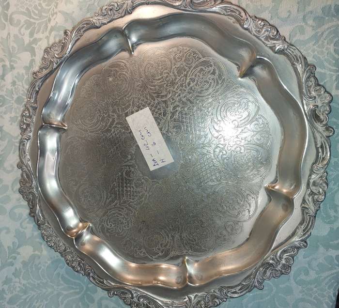 A ROUND VINTAGE VICTORIAN SERVING TRAY SILVER PLATED SOLD AS IS