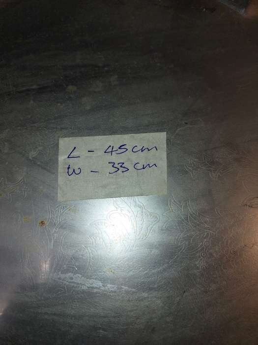 A VINTAGE STAINLESS STEEL SERVING TRAY NEEDS POLISHING